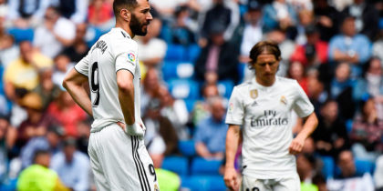 Real Madrid's French forward Karim Benzema and Real Madrid's Croatian midfielder Luka Modric (back) react after Real Betis scored a goal during the Spanish League football match between Real Madrid and Real Betis at the Santiago Bernabeu stadium in Madrid on May 19, 2019. (Photo by PIERRE-PHILIPPE MARCOU / AFP) (Photo credit should read PIERRE-PHILIPPE MARCOU/AFP/Getty Images)