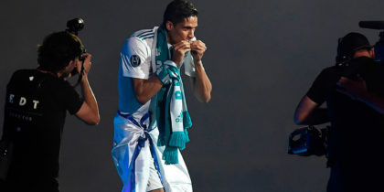 Real Madrid's French defender Raphael Varane arrives at the Santiago Bernabeu stadium in Madrid on May 27, 2018 during a victory ceremony after Real Madrid won its third Champions League title in a row in Kiev. (Photo by OSCAR DEL POZO / AFP) (Photo credit should read OSCAR DEL POZO/AFP/Getty Images)