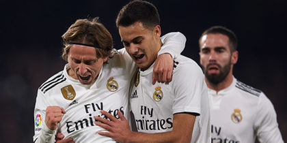 SEVILLE, SPAIN - JANUARY 13: Luka Modric of Real Madrid CF (L) celebrates after scoring with Sergio Reguilon of Real Madrid CF (R) during the La Liga match between Real Betis Balompie and Real Madrid CF at Estadio Benito Villamarin on January 13, 2019 in Seville, Spain. (Photo by Aitor Alcalde/Getty Images)