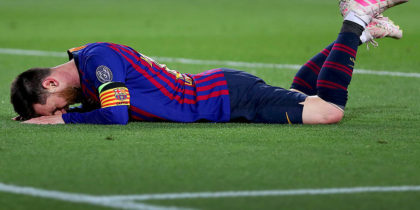 BARCELONA, SPAIN - MAY 01: Lionel Messi of Barcelona lies on the pitch after the UEFA Champions League Semi Final first leg match between Barcelona and Liverpool at the Nou Camp on May 01, 2019 in Barcelona, Spain. (Photo by Catherine Ivill/Getty Images)
