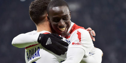 Lyon's French midfielder Houssem Aouar (L) celebrates after scoring a goal with Lyon's French defender Ferland Mendy (R) during the French L1 football match between Lyon (OL) and Monaco (ASM) on December 16, 2018, at the Groupama Stadium in Decines-Charpieu near Lyon, central-eastern France. (Photo by ROMAIN LAFABREGUE / AFP) (Photo credit should read ROMAIN LAFABREGUE/AFP/Getty Images)
