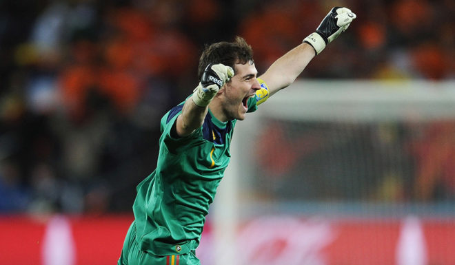 Iker Casillas JOHANNESBURG, SOUTH AFRICA - JULY 11: Iker Casillas, captain of Spain, celebrates the late goal by Andres Iniesta during the 2010 FIFA World Cup South Africa Final match between Netherlands and Spain at Soccer City Stadium on July 11, 2010 in Johannesburg, South Africa. (Photo by Jasper Juinen/Getty Images)