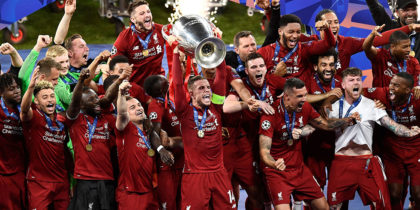 Liverpool's players celebrate with the trophy after winning the UEFA Champions League final football match between Liverpool and Tottenham Hotspur at the Wanda Metropolitan Stadium in Madrid on June 1, 2019. (Photo by OSCAR DEL POZO / AFP) (Photo credit should read OSCAR DEL POZO/AFP/Getty Images)