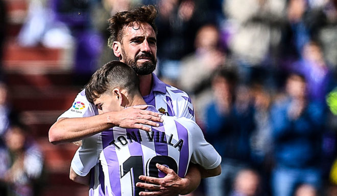 Borja Fernandez (l.), Toni Vila (r.) Real Valladolid's Spanish midfielder Borja Fernandez (L) hugs Real Valladolid's Spanish midfielder Toni Vila during the Spanish league football match between Real Valladolid FC and Valencia CF at the Jose Zorrilla stadium in Valladolid on May 18, 2019. - Spanish police were carrying out an operation today against several footballers --among them Spanish player Borja Fernandez-- ex-players and club managers accused of fixing matches in the first and second divisions, a source close to the probe said. (Photo by OSCAR DEL POZO / AFP) (Photo credit should read OSCAR DEL POZO/AFP/Getty Images)