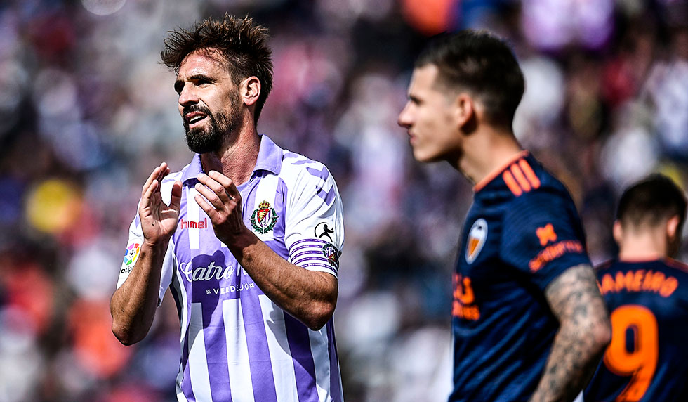 Real Valladolid's Spanish midfielder Borja Fernandez applauds during the Spanish league football match between Real Valladolid FC and Valencia CF at the Jose Zorrilla stadium in Valladolid on May 18, 2019. - Spanish police were carrying out an operation today against several footballers --among them Spanish player Borja Fernandez-- ex-players and club managers accused of fixing matches in the first and second divisions, a source close to the probe said. (Photo by OSCAR DEL POZO / AFP) (Photo credit should read OSCAR DEL POZO/AFP/Getty Images)