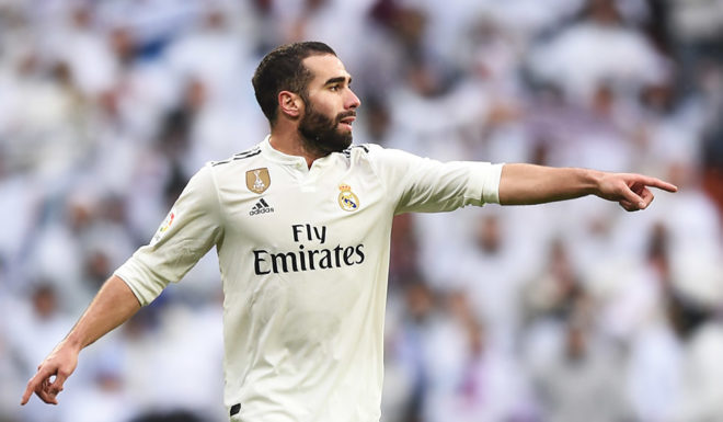 MADRID, SPAIN - JANUARY 19: Dani Carvajal of Real Madrid CF reacts during the La Liga match between Real Madrid CF and Sevilla FC at Estadio Santiago Bernabeu on January 19, 2019 in Madrid, Spain. (Photo by Denis Doyle/Getty Images)