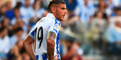 Barcelona's Argentinian forward Lionel Messi (R) and Real Sociedad's French defender Theo Hernandez react during the Spanish league football match between Real Sociedad and FC Barcelona at the Anoeta stadium in San Sebastian on September 15, 2018. (Photo by GABRIEL BOUYS / AFP) (Photo credit should read GABRIEL BOUYS/AFP/Getty Images)