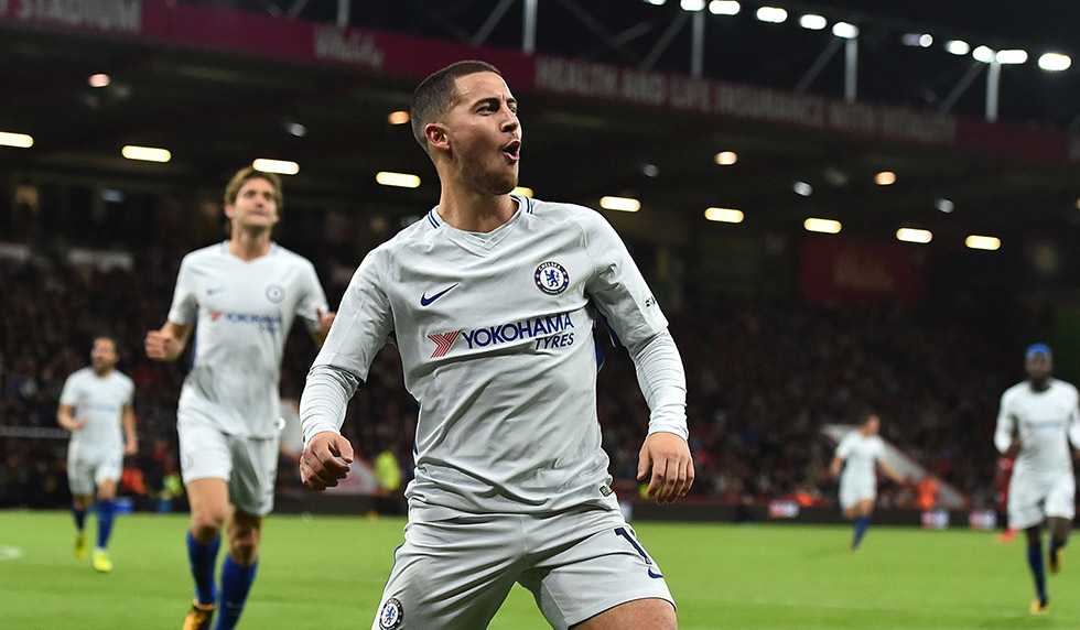 Chelsea's Belgian midfielder Eden Hazard celebrates after scoring the opening goal of the English Premier League football match between Bournemouth and Chelsea at the Vitality Stadium in Bournemouth, southern England on October 28, 2017. / AFP PHOTO / Glyn KIRK / RESTRICTED TO EDITORIAL USE. No use with unauthorized audio, video, data, fixture lists, club/league logos or 'live' services. Online in-match use limited to 75 images, no video emulation. No use in betting, games or single club/league/player publications. / (Photo credit should read GLYN KIRK/AFP/Getty Images)