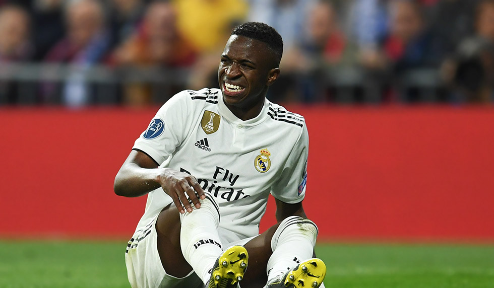 MADRID, SPAIN - MARCH 05: Vinicius Junior of Real Madrid is injured during the UEFA Champions League Round of 16 Second Leg match between Real Madrid and Ajax at Bernabeu on March 05, 2019 in Madrid, Spain. (Photo by David Ramos/Getty Images)