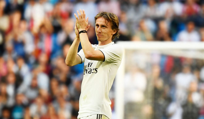 Luka Modrić Real Madrid's Croatian midfielder Luka Modric acknowledges fans as he leaves the pitch during the Spanish league football match between Real Madrid CF and RC Celta de Vigo at the Santiago Bernabeu stadium in Madrid on March 16, 2019. (Photo by GABRIEL BOUYS / AFP) (Photo credit should read GABRIEL BOUYS/AFP/Getty Images)