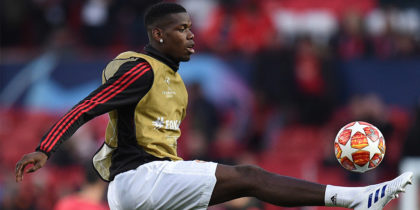 Manchester United's French midfielder Paul Pogba warms up before the UEFA Champions league first leg quarter-final football match between Manchester United and Barcelona at Old Trafford in Manchester, north west England, on April 10, 2019. (Photo by Oli SCARFF / AFP) (Photo credit should read OLI SCARFF/AFP/Getty Images)