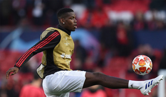 Manchester United's French midfielder Paul Pogba warms up before the UEFA Champions league first leg quarter-final football match between Manchester United and Barcelona at Old Trafford in Manchester, north west England, on April 10, 2019. (Photo by Oli SCARFF / AFP) (Photo credit should read OLI SCARFF/AFP/Getty Images)