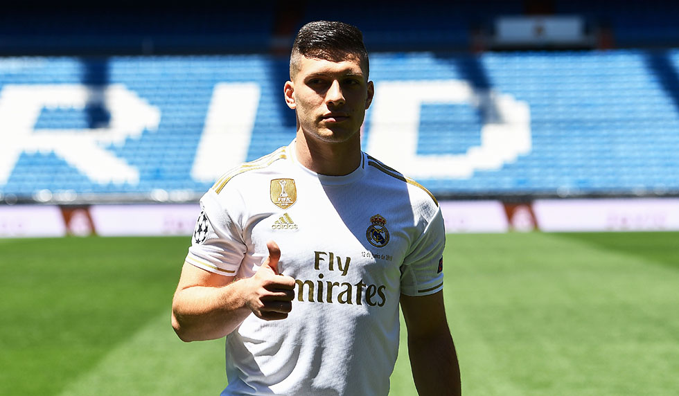 Real Madrid's Serbian forward Luka Jovic poses at the Santiago Bernabeu stadium in Madrid on June 12, 2019 during his official presentation. - Real Madrid have signed 21-year-old Serbia striker Luka Jovic from German side Eintracht Frankfurt on a six-year deal for an undisclosed fee. (Photo by PIERRE-PHILIPPE MARCOU / AFP) (Photo credit should read PIERRE-PHILIPPE MARCOU/AFP/Getty Images)