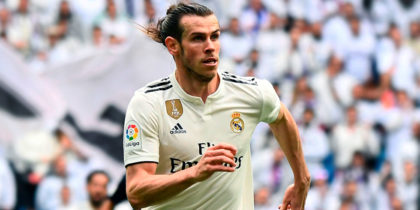 Real Madrid's Welsh forward Gareth Bale eyes the ball during the Spanish league football match between Real Madrid CF and SD Eibar at the Santiago Bernabeu stadium in Madrid on April 6, 2019. (Photo by GABRIEL BOUYS / AFP) (Photo credit should read GABRIEL BOUYS/AFP/Getty Images)