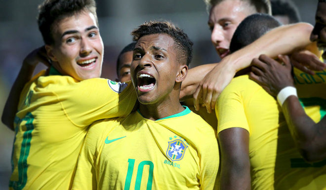 Rodrygo Goes Brazil's Rodrygo (C) celebrates with teammates after scoring against Venezuela during their South American U-20 football match at El Teniente stadium in Rancagua, Chile on January 21, 2019. (Photo by CLAUDIO REYES / AFP) (Photo credit should read CLAUDIO REYES/AFP/Getty Images)