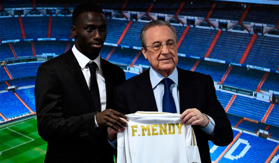 French defender Ferland Mendy (L) and Real Madrid's president Florentino Perez pose during the official presentation of the footballer as new player of the Spanish club at the Santiago Bernabeu stadium in Madrid on June 19, 2019. (Photo by OSCAR DEL POZO / AFP) (Photo credit should read OSCAR DEL POZO/AFP/Getty Images)
