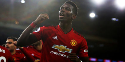Manchester United's French midfielder Paul Pogba celebrates after Manchester United's English midfielder Jesse Lingard scores their fifth goal during the English Premier League football match between between Cardiff City and Manchester United at Cardiff City Stadium in Cardiff, south Wales on December 22, 2018. - Manchester United won the game 5-1. (Photo by Geoff CADDICK / AFP) / RESTRICTED TO EDITORIAL USE. No use with unauthorized audio, video, data, fixture lists, club/league logos or 'live' services. Online in-match use limited to 120 images. An additional 40 images may be used in extra time. No video emulation. Social media in-match use limited to 120 images. An additional 40 images may be used in extra time. No use in betting publications, games or single club/league/player publications. / (Photo credit should read GEOFF CADDICK/AFP/Getty Images)