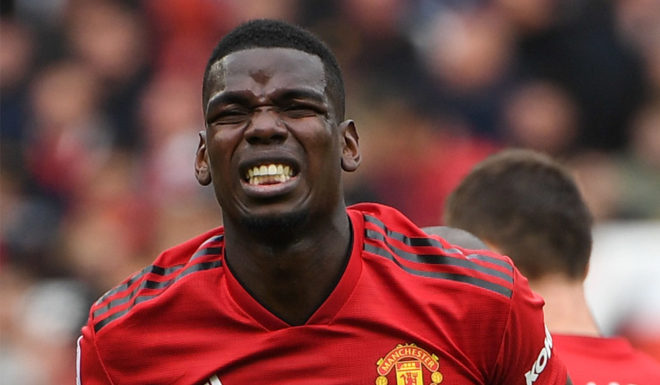 Manchester United's French midfielder Paul Pogba reacts after being fouled during the English Premier League football match between Manchester United and Chelsea at Old Trafford in Manchester, north west England, on April 28, 2019. (Photo by Paul ELLIS / AFP) / RESTRICTED TO EDITORIAL USE. No use with unauthorized audio, video, data, fixture lists, club/league logos or 'live' services. Online in-match use limited to 120 images. An additional 40 images may be used in extra time. No video emulation. Social media in-match use limited to 120 images. An additional 40 images may be used in extra time. No use in betting publications, games or single club/league/player publications. / (Photo credit should read PAUL ELLIS/AFP/Getty Images)