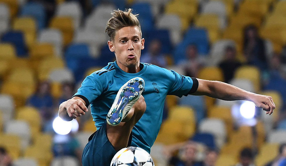 Real Madrid's Spanish miedfieder Marcos Llorente controls the ball during a Real Madrid team training session at the Olympic Stadium in Kiev, Ukraine on May 25, 2018, on the eve of the UEFA Champions League final football match between Liverpool and Real Madrid. (Photo by Franck FIFE / AFP) (Photo credit should read FRANCK FIFE/AFP/Getty Images)