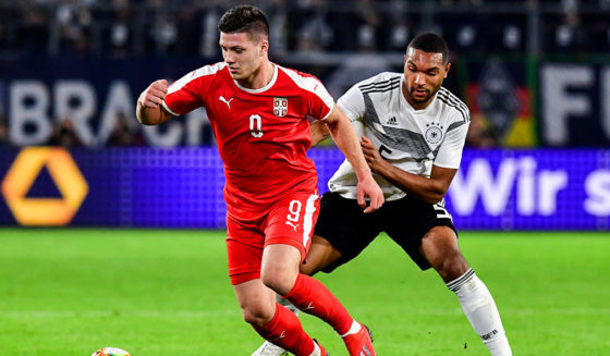 Luka Jović Serbia's forward Luka Jovic (L) and Germany's defender Jonathan Tah vie for the ball during the friendly football match Germany v Serbia in Wolfsburg, western Germany on March 20, 2019. (Photo by Tobias SCHWARZ / AFP) / RESTRICTIONS: ACCORDING TO DFB RULES IMAGE SEQUENCES TO SIMULATE VIDEO IS NOT ALLOWED DURING MATCH TIME. MOBILE (MMS) USE IS NOT ALLOWED DURING AND FOR FURTHER TWO HOURS AFTER THE MATCH. == RESTRICTED TO EDITORIAL USE == FOR MORE INFORMATION CONTACT DFB DIRECTLY AT +49 69 67880 / (Photo credit should read Tobias Schwarz/AFP/Getty Images)