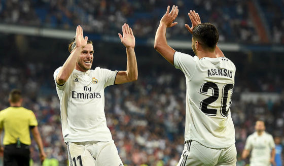 MADRID, SPAIN - AUGUST 19: Gareth Bale of Real Madrid celebrates with Marco Asensio after scoring his teams second goal during the La Liga match between Real Madrid CF and Getafe CF at Estadio Santiago Bernabeu on August 19, 2018 in Madrid, Spain. (Photo by Denis Doyle/Getty Images)
