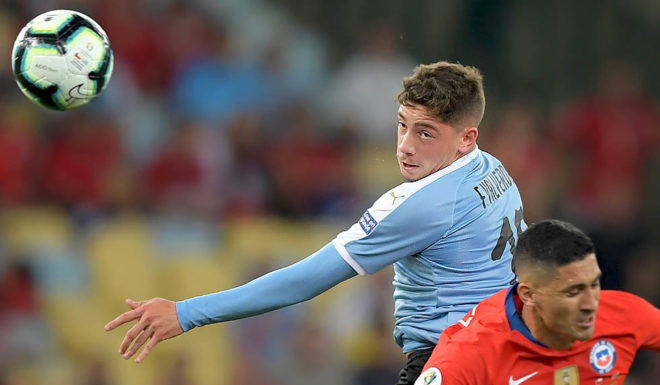 Fede Valverde Uruguay's Federico Valverde (L) and Chile's Pedro Pablo Hernandez jump for the ball during their Copa America football tournament group match at Maracana Stadium in Rio de Janeiro, Brazil, on June 24, 2019. (Photo by Carl DE SOUZA / AFP) (Photo credit should read CARL DE SOUZA/AFP/Getty Images)