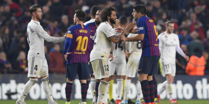 Real Madrid's Brazilian defender Marcelo (C) and Barcelona's Uruguayan forward Luis Suarez talk at the end of the Spanish Copa del Rey (King's Cup) semi-final first leg football match between FC Barcelona and Real Madrid CF at the Camp Nou stadium in Barcelona on February 6, 2019. (Photo by LLUIS GENE / AFP) (Photo credit should read LLUIS GENE/AFP/Getty Images)