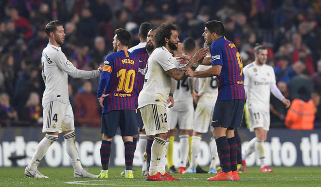El Clásico Real Madrid's Brazilian defender Marcelo (C) and Barcelona's Uruguayan forward Luis Suarez talk at the end of the Spanish Copa del Rey (King's Cup) semi-final first leg football match between FC Barcelona and Real Madrid CF at the Camp Nou stadium in Barcelona on February 6, 2019. (Photo by LLUIS GENE / AFP) (Photo credit should read LLUIS GENE/AFP/Getty Images)