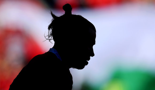 Gareth Bale CARDIFF, WALES - MARCH 24: Gareth Bale of Wales walks out onto the pitch ahead of the 2020 UEFA European Championships group E qualifying match between Wales and Slovakia at Cardiff City Stadium on March 24, 2019 in Cardiff, United Kingdom. (Photo by Catherine Ivill/Getty Images)