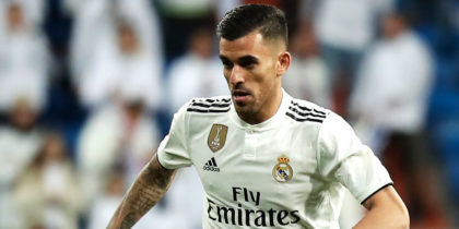 MADRID, SPAIN - MARCH 31: Dani Ceballos of Real Madrid is closed down by Camilo Hernandez of Huesca during the La Liga match between Real Madrid CF and SD Huesca at Estadio Santiago Bernabeu on March 31, 2019 in Madrid, Spain. (Photo by Gonzalo Arroyo Moreno/Getty Images)