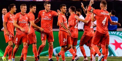Real Madrid's Welsh forward Gareth Bale celebrates his goal with his teammates against AS Roma during their 2018 International Champions Cup at the MetLife stadium on August 07, 2018, in East Rutherford, NJ. (Photo by EDUARDO MUNOZ ALVAREZ / AFP) (Photo credit should read EDUARDO MUNOZ ALVAREZ/AFP/Getty Images)