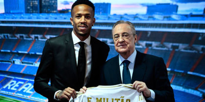 Brazilian defender Eder Militao (L) poses with Real Madrid president Florentino Perez (R) during his official presentation as Real Madrid new player at the Santiago Bernabeu stadium in Madrid on July 10, 2019. (Photo by OSCAR DEL POZO / AFP) (Photo credit should read OSCAR DEL POZO/AFP/Getty Images)