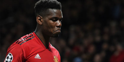 TOPSHOT - Manchester United's French midfielder Paul Pogba leaves the pitch after being shown a red card during the first leg of the UEFA Champions League round of 16 football match between Manchester United and Paris Saint-Germain (PSG) at Old Trafford in Manchester, north-west England on February 12, 2019. - PSG won the match 2-0. (Photo by Paul ELLIS / AFP) (Photo credit should read PAUL ELLIS/AFP/Getty Images)