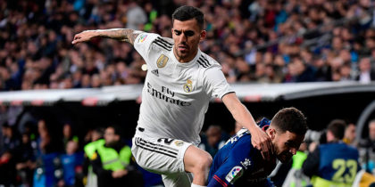 Real Madrid's Spanish midfielder Daniel Ceballos (L) challenges SD Huesca's Spanish midfielder Javi Galan during the Spanish League football match between Real Madrid CF and SD Huesca at the Santiago Bernabeu stadium in Madrid on March 31, 2019. (Photo by JAVIER SORIANO / AFP) (Photo credit should read JAVIER SORIANO/AFP/Getty Images)