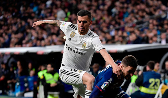 Real Madrid's Spanish midfielder Daniel Ceballos (L) challenges SD Huesca's Spanish midfielder Javi Galan during the Spanish League football match between Real Madrid CF and SD Huesca at the Santiago Bernabeu stadium in Madrid on March 31, 2019. (Photo by JAVIER SORIANO / AFP) (Photo credit should read JAVIER SORIANO/AFP/Getty Images)
