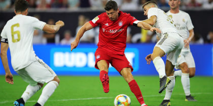 HOUSTON, TEXAS - JULY 20: Robert Lewandowski of Bayern Muenchen scores the 2nd team goal during the International Champions Cup match between Bayern Muenchen and Real Madrid in the 2019 International Champions Cup at NRG Stadium on July 20, 2019 in Houston, Texas. (Photo by Alexander Hassenstein/Bongarts/Getty Images)