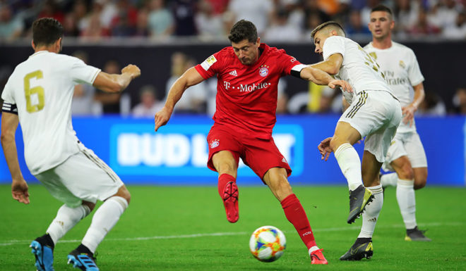 HOUSTON, TEXAS - JULY 20: Robert Lewandowski of Bayern Muenchen scores the 2nd team goal during the International Champions Cup match between Bayern Muenchen and Real Madrid in the 2019 International Champions Cup at NRG Stadium on July 20, 2019 in Houston, Texas. (Photo by Alexander Hassenstein/Bongarts/Getty Images)