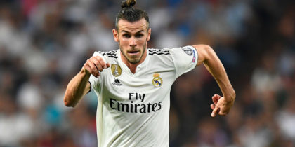 Real Madrid's Welsh forward Gareth Bale (L) vies with Roma's French midfielder Steven Nzonzi during the UEFA Champions League group G football match between Real Madrid CF and AS Roma at the Santiago Bernabeu stadium in Madrid on September 19, 2018. (Photo by GABRIEL BOUYS / AFP) (Photo credit should read GABRIEL BOUYS/AFP/Getty Images)