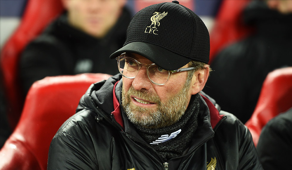 Liverpool's German manager Jurgen Klopp awaits kick off in the UEFA Champions League round of 16, first leg football match between Liverpool and Bayern Munich at Anfield stadium in Liverpool, north-west England on February 19, 2019. (Photo by Oli SCARFF / AFP) (Photo credit should read OLI SCARFF/AFP/Getty Images)