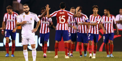 Real Madrid's Dani Carvajal (L) reacts after a goal from Atletico Madrid during the 2019 International Champions Cup football match between Real Madrid and Atletico Madrid at the Metlife Stadium Arena in East Rutherford, New Jersey on July 26, 2019. (Photo by Johannes EISELE / AFP) (Photo credit should read JOHANNES EISELE/AFP/Getty Images)