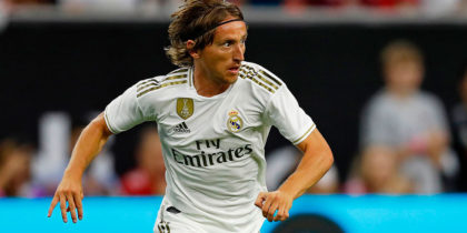 Real Madrid midfielder Luka Modric dribbles the ball downfield against Bayern Munich during their International Champions Cup match on July 20, 2019 at NRG Stadium in Houston, Texas. (Photo by AARON M. SPRECHER / AFP) (Photo credit should read AARON M. SPRECHER/AFP/Getty Images)