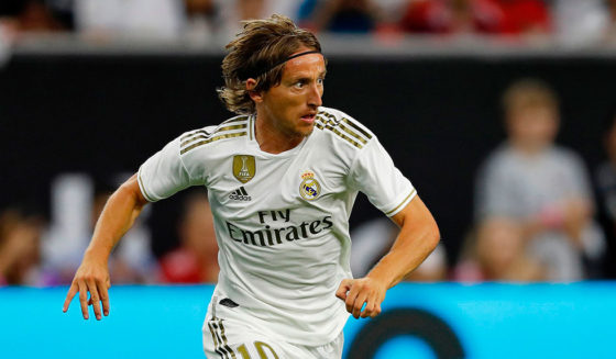 Real Madrid midfielder Luka Modric dribbles the ball downfield against Bayern Munich during their International Champions Cup match on July 20, 2019 at NRG Stadium in Houston, Texas. (Photo by AARON M. SPRECHER / AFP) (Photo credit should read AARON M. SPRECHER/AFP/Getty Images)