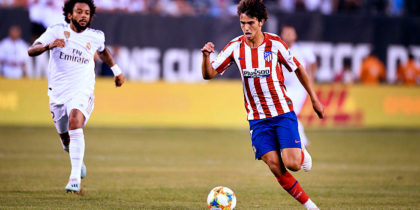 Real Madrid's Brazilian defender Marcelo (L) runs after Atletico Madrid's Portuguese midfielder Joao Felix as he controls the ball during their 2019 International Champions Cup football match between Real Madrid and Atletico Madrid at the Metlife Stadium Arena in East Rutherford, New Jersey on July 26, 2019. (Photo by Johannes EISELE / AFP) (Photo credit should read JOHANNES EISELE/AFP/Getty Images)