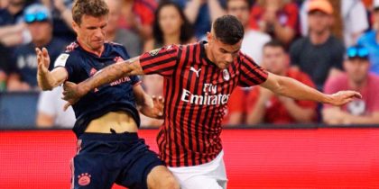 Bayern Munich's Thomas Muller (L) fights for the ball with Milan's Theo Hernandez during their International Champions Cup football match between Fc Bayern and AC Milan at Children's Mercy Park in Kansas City, Kansas on July 23, 2019. (Photo by Tim VIZER / AFP) (Photo credit should read TIM VIZER/AFP/Getty Images)