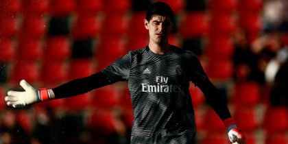 Real Madrid's Belgian goalkeeper Thibaut Courtois warms up before the Spanish League football match between Rayo Vallecano and Real Madrid at the Vallecas Stadium in the Madrid district of Puente de Vallecas on April 28, 2019. (Photo by Benjamin CREMEL / AFP) (Photo credit should read BENJAMIN CREMEL/AFP/Getty Images)