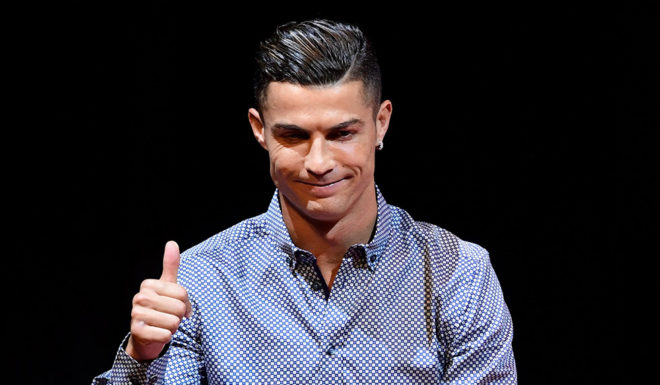 Portugal and Juventus forward Cristiano Ronaldo gives a thumbs-up as he delivers a speech after receiving the MARCA Leyenda (MARCA Legend) award in Madrid on July 29, 2019. - The award is attributed to sport professionals by the Spanish sports newspaper MARCA. (Photo by JAVIER SORIANO / AFP) (Photo credit should read JAVIER SORIANO/AFP/Getty Images)