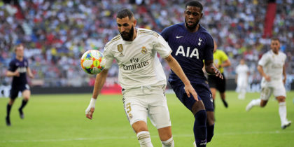 MUNICH, GERMANY - JULY 30: Karim Benzema (R) of Madrid challenges Daniel Lee Rose of Tottenham during the Audi Cup 2019 semi final match between Real Madrid and Tottenham Hotspur at Allianz Arena on July 30, 2019 in Munich, Germany. (Photo by Adam Pretty/Bongarts/Getty Images)