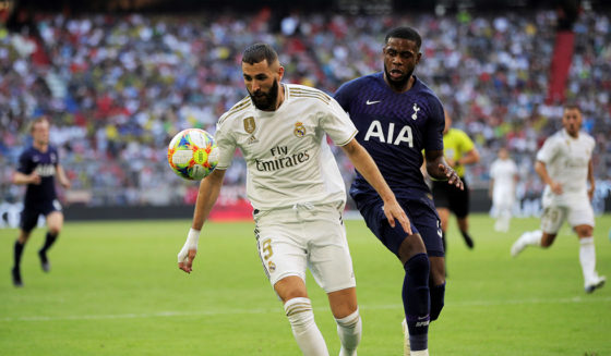 MUNICH, GERMANY - JULY 30: Karim Benzema (R) of Madrid challenges Daniel Lee Rose of Tottenham during the Audi Cup 2019 semi final match between Real Madrid and Tottenham Hotspur at Allianz Arena on July 30, 2019 in Munich, Germany. (Photo by Adam Pretty/Bongarts/Getty Images)