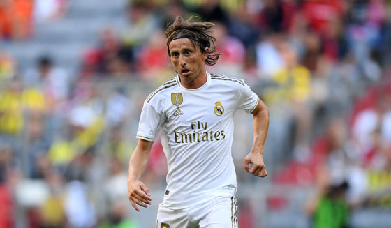 MUNICH, GERMANY - JULY 30: Luca Modric of Madrid runs with the ball during the Audi Cup 2019 semi final match between Real Madrid and Tottenham Hotspur at Allianz Arena on July 30, 2019 in Munich, Germany. (Photo by Matthias Hangst/Bongarts/Getty Images)