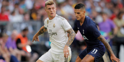 MUNICH, GERMANY - JULY 30: Toni Kroos (L) of Madrid challenges Erik Manuel Lamela Cordero of Tottenham during the Audi Cup 2019 semi final match between Real Madrid and Tottenham Hotspur at Allianz Arena on July 30, 2019 in Munich, Germany. (Photo by Adam Pretty/Bongarts/Getty Images)
